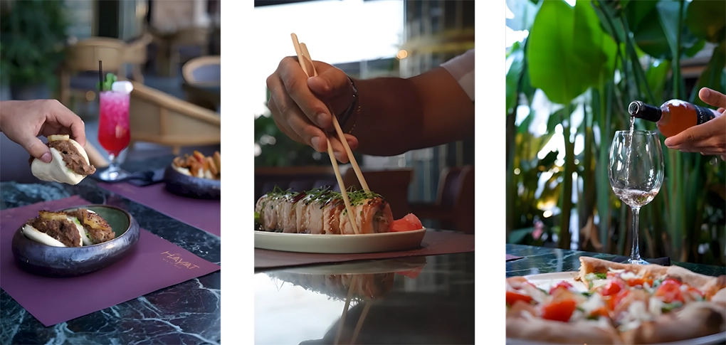 Elegant food and drink presentation at Al Hayat restaurant, including bao buns, sushi, and wine